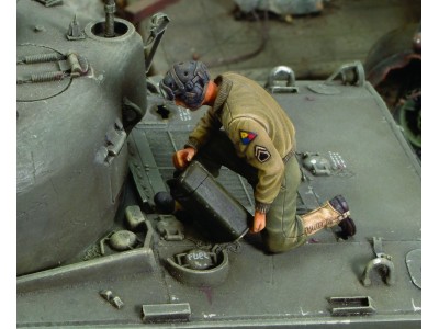 U.S. CREW member refuelling tank - WWII 